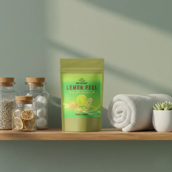 ACTIZEET lemon peel powder pouch on a wooden bathroom shelf next to apothecary jars