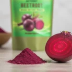 Close-up of fine ACTIZEET powder texture next to a sliced beetroot cross-section